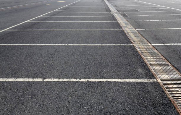 istock Empty car parking lot area outdoors 1181321196
