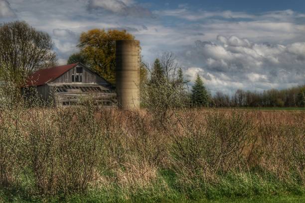istock 0034 - Old Wooden Barn and Silo 1181325212