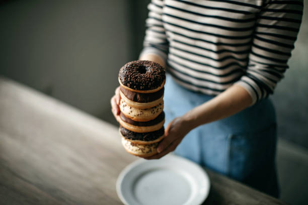 Woman holding donut