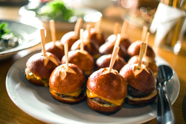 Mini Hamburgers on wooden background