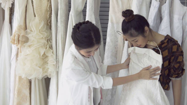 istock Future bride customer talking with wedding store shopkeeper 1181336169
