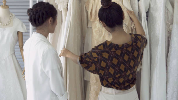 istock Future bride customer talking with wedding store shopkeeper 1181336174