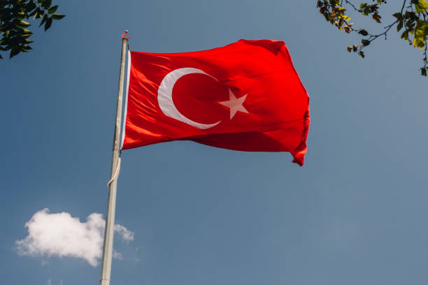 istock Turkish national flag with white star and moon in sky 1181337660