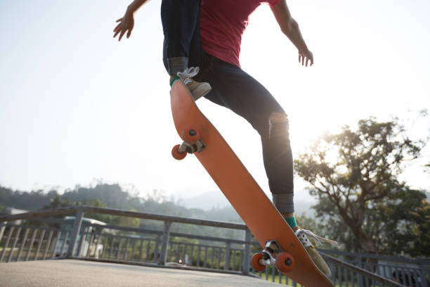 istock Skateboarder skateboarding on skate park 1181338425