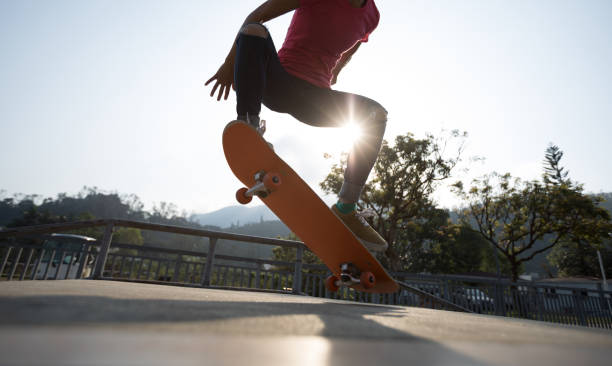 istock Skateboarder skateboarding on skate park 1181338447