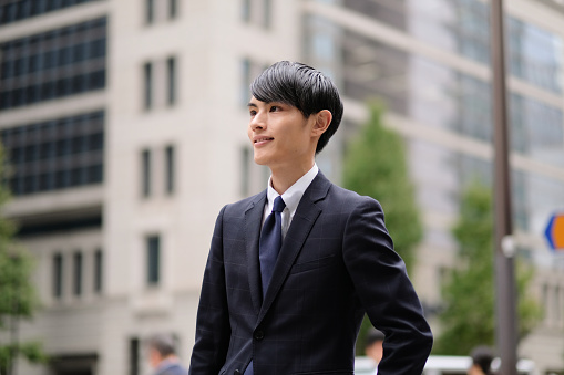 Portrait of young businessman in Marunouchi, Tokyo