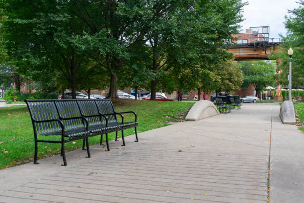 istock Empty Park in Wicker Park Chicago with Elevated Train Tracks and a Bench 1181343797