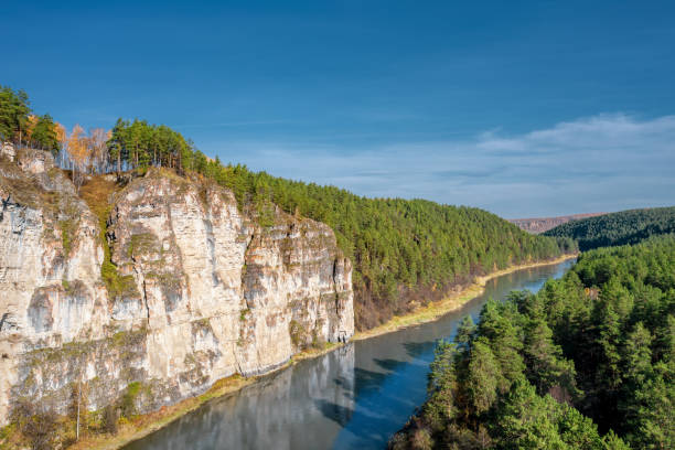istock Aerial view; camera moving around steep cliff 1181345633