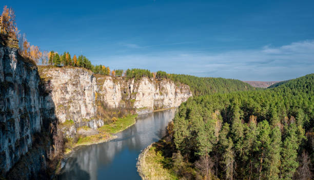 istock Aerial view; camera making panorama of landscape with cliffs forest 1181345651