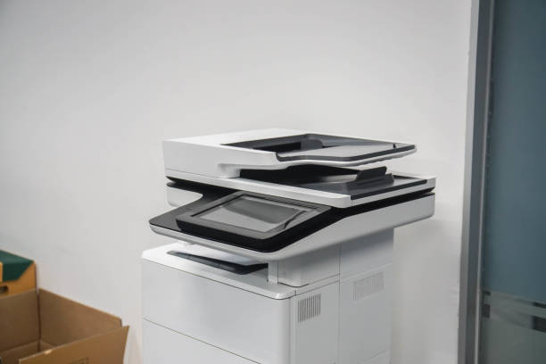 istock standing multifunctional office laser printer for use in scanning and printing business documents in workplace 1181345693