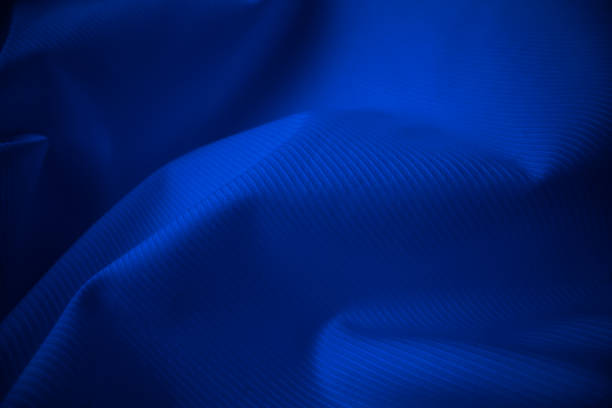 istock Shiny flowing cloth texture in macro shot. 1181346655