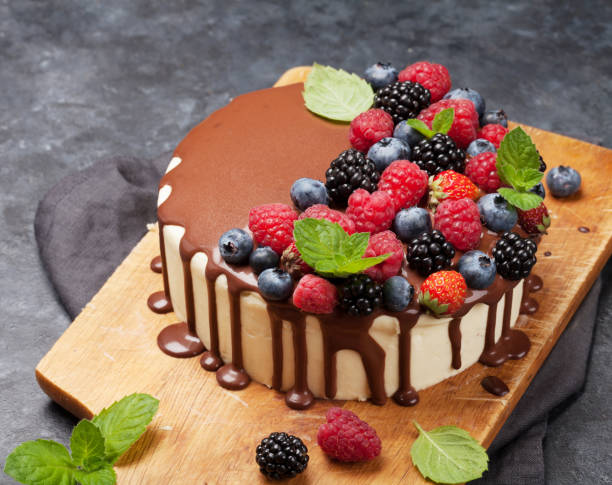 istock Cheesecake with berries and chocolate 1181346798