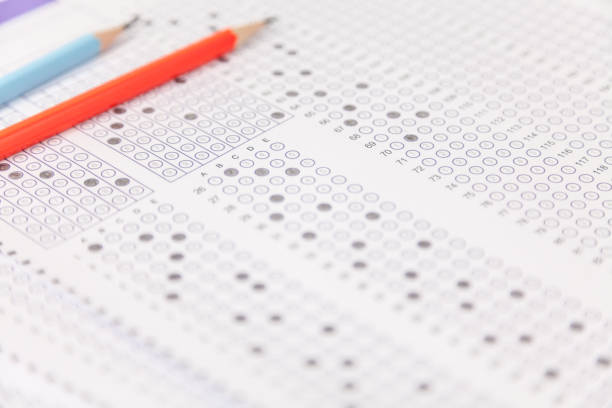 istock exams quiz test paper with pencil 1181349425