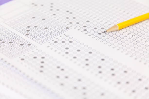 istock exams quiz test paper with pencil 1181349426