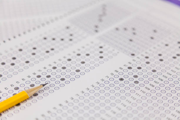 istock exams quiz test paper with pencil 1181349427