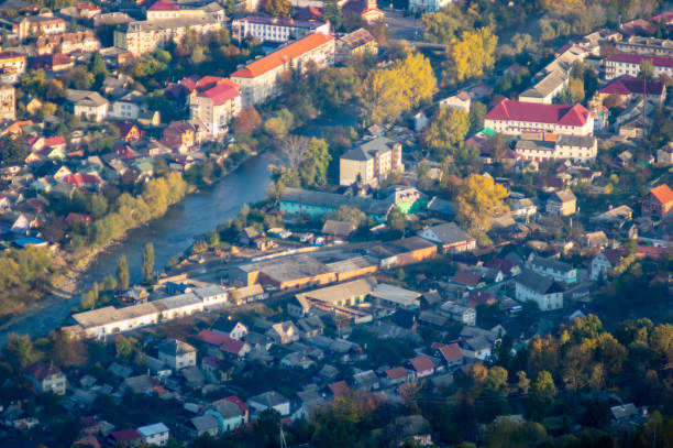istock A small town among the mountains in autumn, top view 1181353086