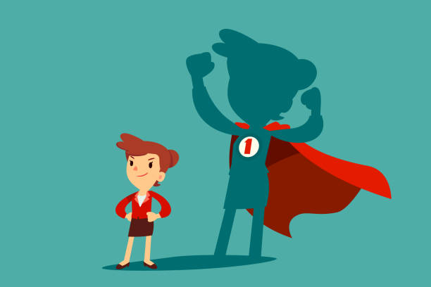 istock businesswoman with her shadow as superhero 1181353860