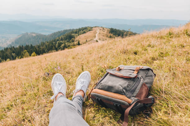 istock hiking concept resting at the peak view on autumn valley copy space 1181355031