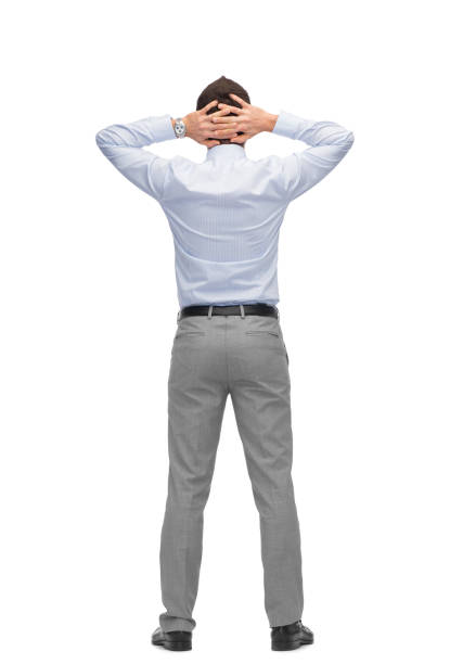 istock businessman with hands behind his head from back 1181357539