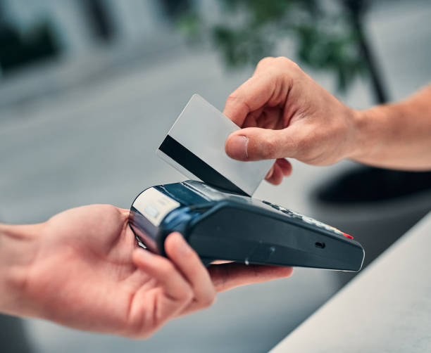 istock Hand with credit card 1181358697