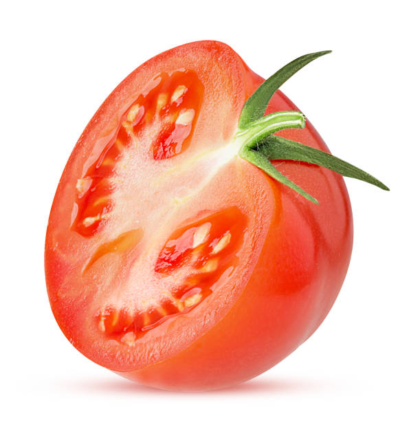 istock Fresh red tomato cut in half with green leaves 1181360028