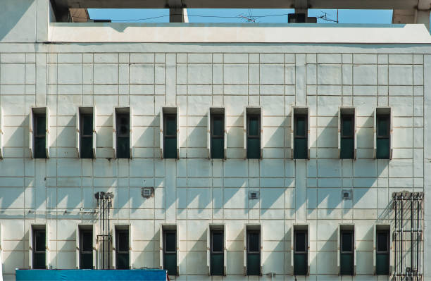 istock Light and shadow of the windows on the building, Natural light backgrounds 1181363568