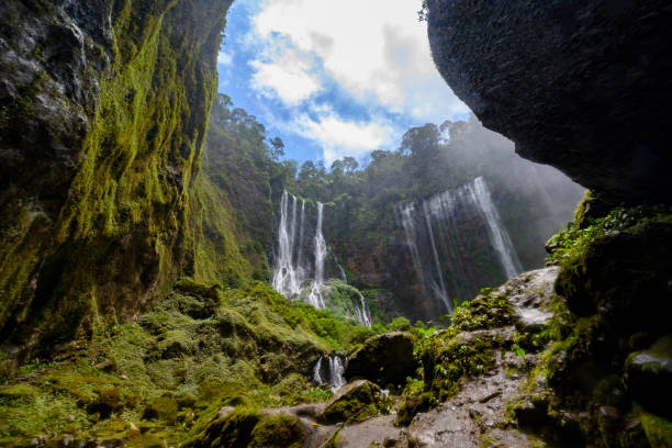 istock Inside the canyon of the Tumpak Sewu waterfall on Java Indonesia 1181363625