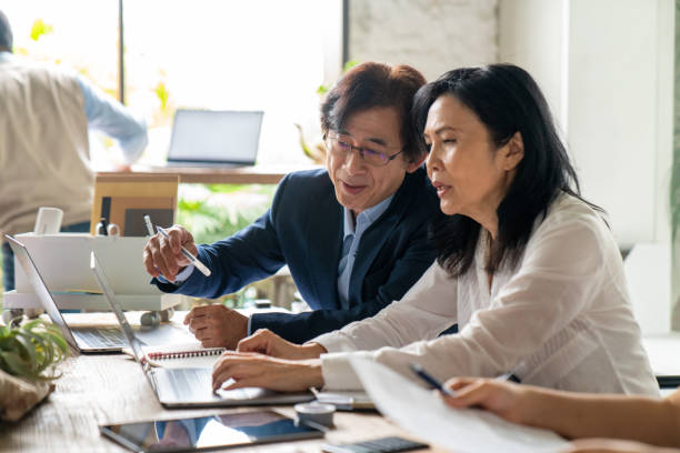 Mid adult workers in a modern office