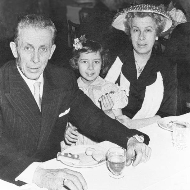 Happy family in the restaurant in 1958