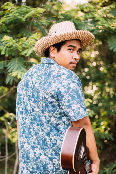 istock Happy farmer play ukulele 1181371366