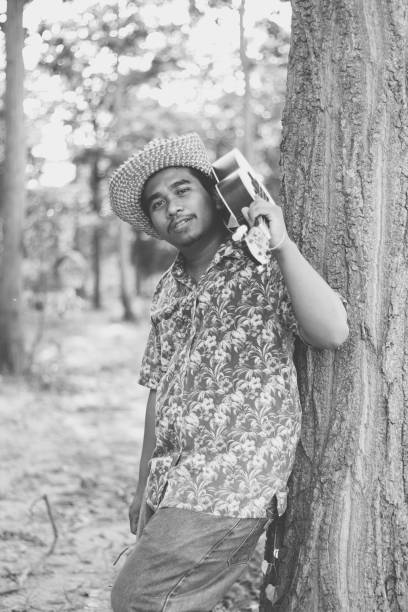 istock Happy farmer play ukulele 1181372020