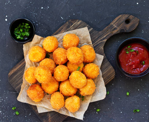 istock cheese balls with tomato sauce. 1181372843