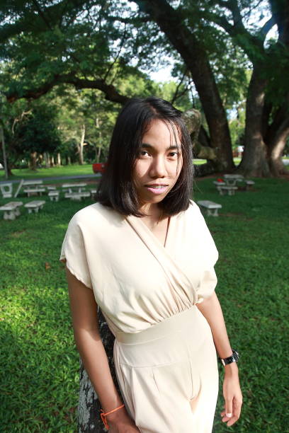 istock pretty Thai girl feeling lonely 1181375117