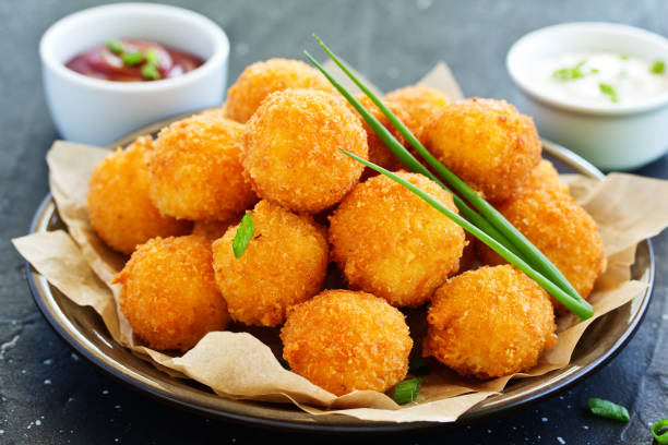 istock cheese balls with tomato sauce. 1181376901