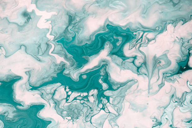 istock Free flowing green and white paint. Marble background or texture. Abstract fluid art 1181378985