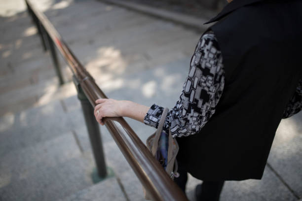 istock Stairs and older women 1181379682