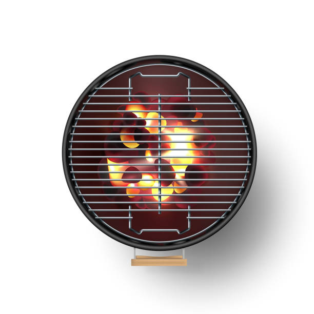 istock Round  black  open barbecue grill top view  realistic vector illustration. Burning coals 1181379900