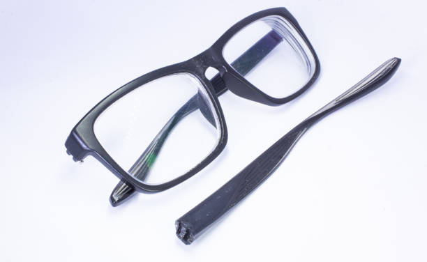 istock Image of a Broken eyeglass or spectacle or reading glass frame with white background 1181380078
