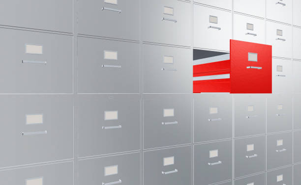 istock 3D Illustration filing cabinet with opened red drawer 1181381483