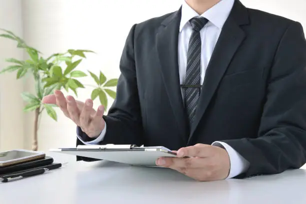 Photo of Business man consulting in office