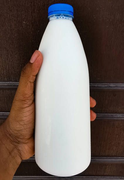 istock milk packed in a plastic bottle with a blue cap 1181383087