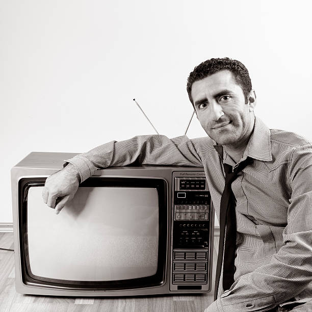 istock Adult Man Sitting By Television 118138501