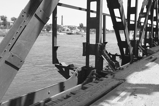 The metal bridge. Black and white photo. Old bridge