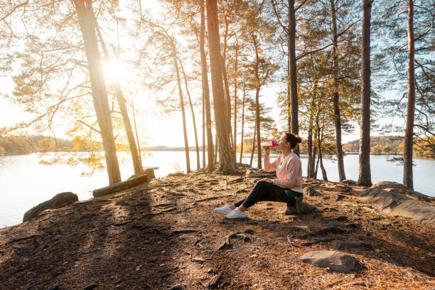 istock Woman drinking a protein shake after outdoor workout 1181386606