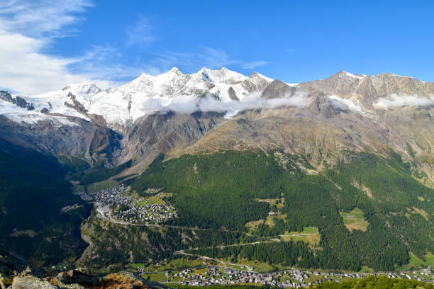 istock Mountain panorama with ski resort Saas Fee in valley. 1181388984