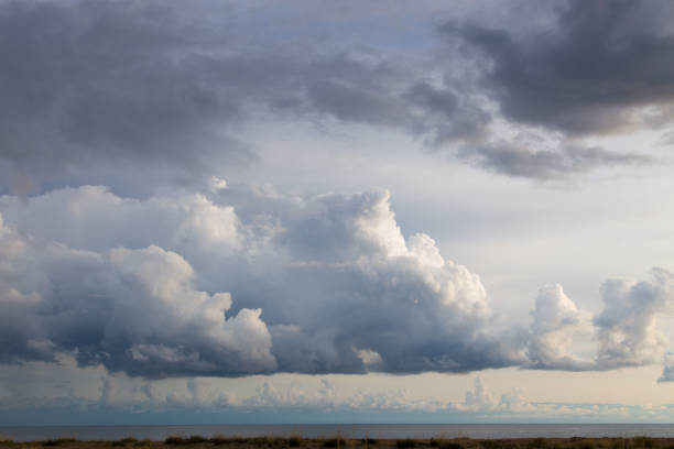 istock Rain cloud. The sky before the rain, gloomy heavy clouds. Natural background 1181389561