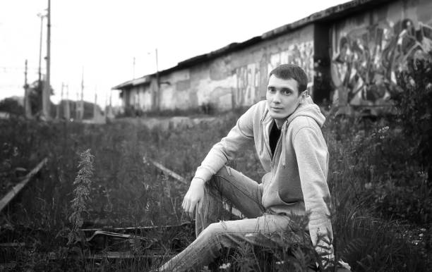 istock man in a hoodie black and white 1181390430