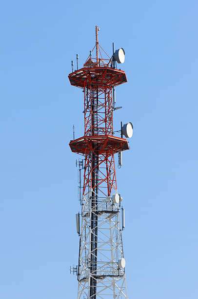 Communications Tower Mobile Phone Base Station  sendemast stock pictures, royalty-free photos & images