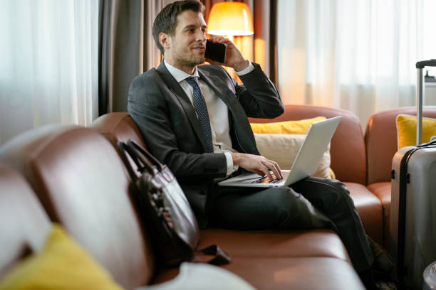 istock Busy businessman working in hotel 1181393629