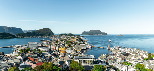 View of Alesund from Fjellstua. Viewpoint on top of the mount Aksla. City of Ålesund in Norway is beautifully situated on several islands on the coast of Sunnmøre, and is the gateway to some of the world's most famous fjords and natural attractions.